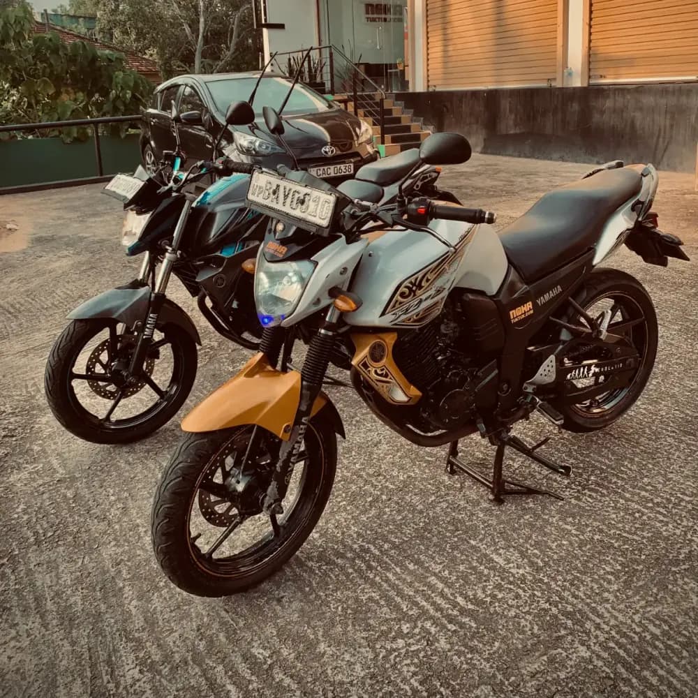 Side view of NOHA 150cc rental motorbikes at the Galle yard